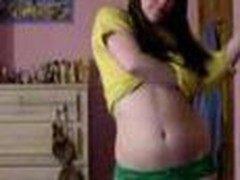 Youthful legal age teenager bedroom strip, yellow top and little green panties cast aside showing her little tits and pussy.